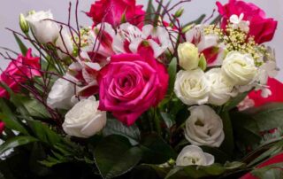 beautiful florist bouquet of roses and freesias
